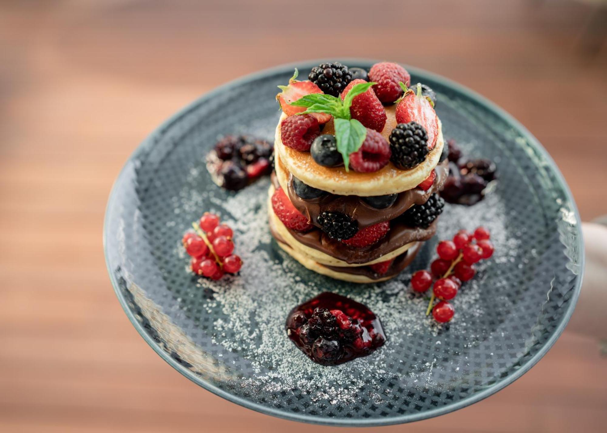 Address Istanbul Hotel Ngoại thất bức ảnh A stack of pancakes with fruit